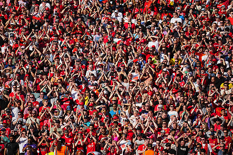 Fans cheer during Liverpool and Wolves match